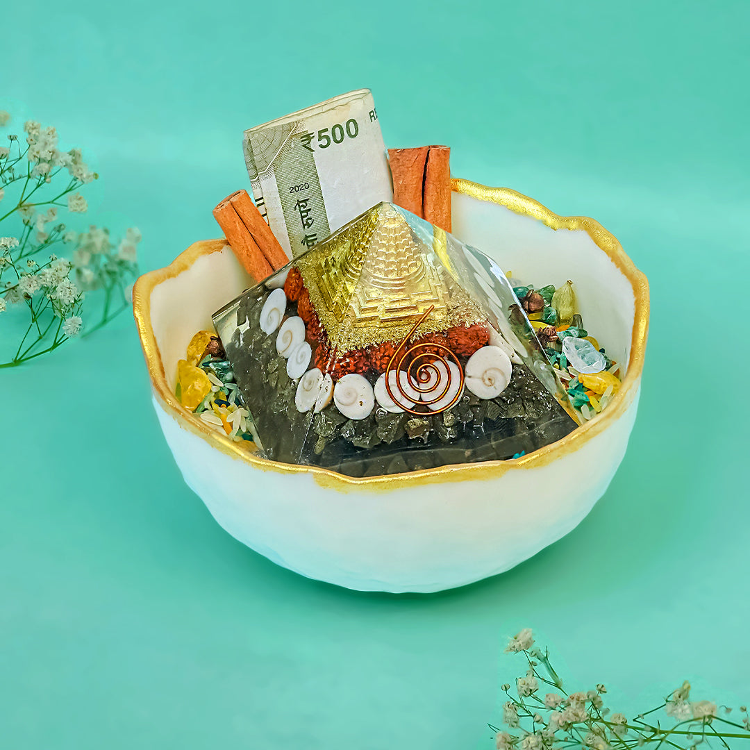 Selenite bowl with gold rim containing Shree Yantra