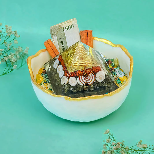 Selenite bowl with gold rim containing Shree Yantra